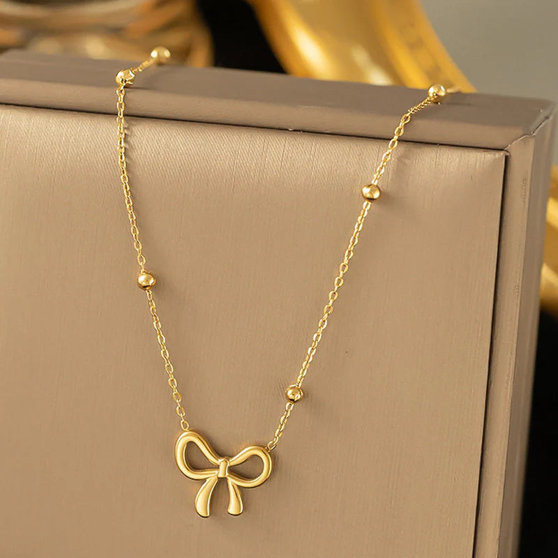 Bow Pendant Necklace with Beaded Chain