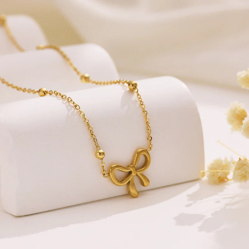 Bow Pendant Necklace with Beaded Chain